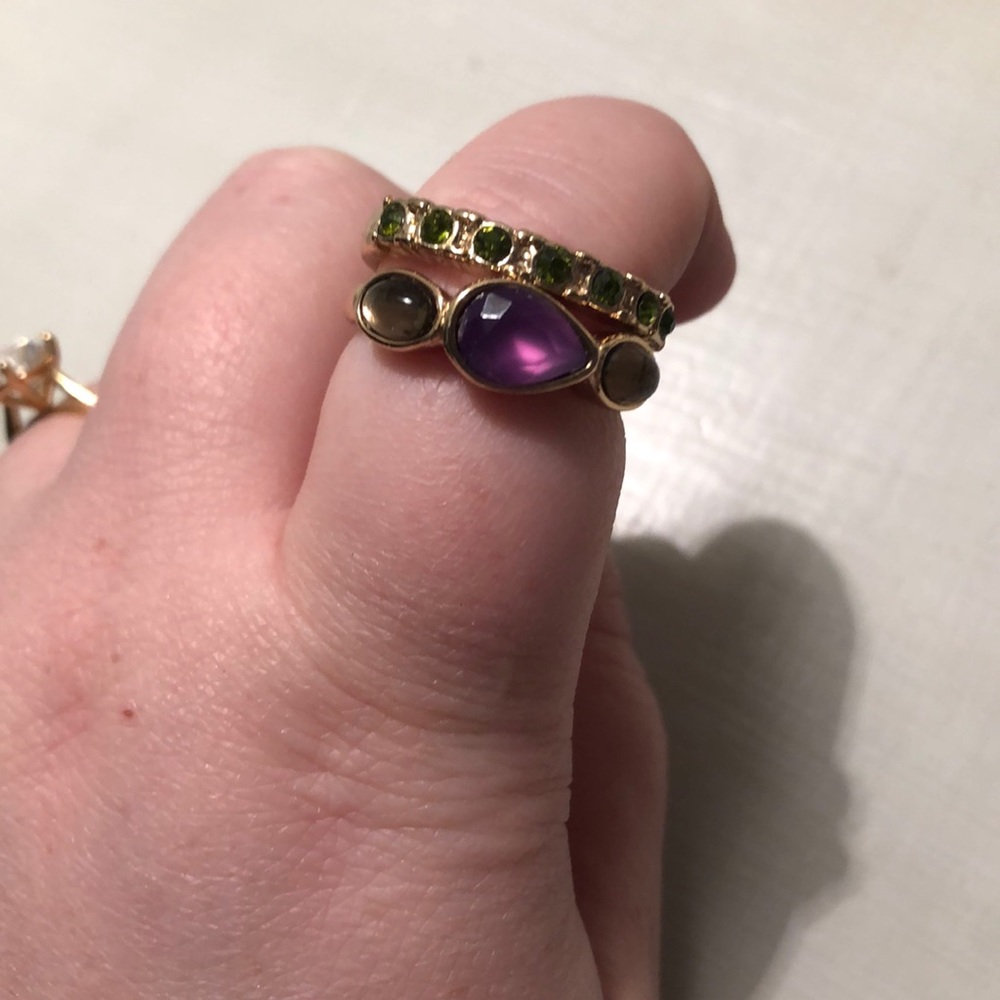 2 rings with purple and green stones